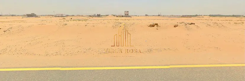 أرض زاوية على شارع وسِكّة في بساتين الزبير – موقع مميز وسعر مغري