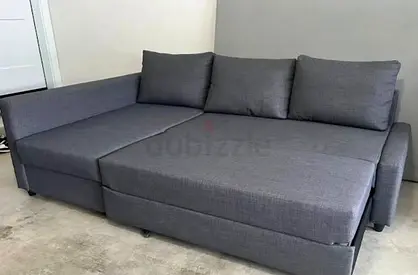 Ikea L Shape Sofa cum bed with big storage in L