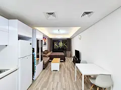 Furnished Studio | Laya Mansion JVC | Balcony with City View