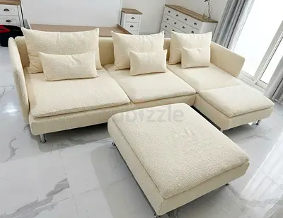 Stylish Modular Cream Sofa Reversible chaise, soft fabric, modern minimalist design, ideal for both