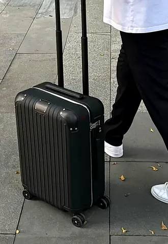 Rimowa blue suitcase