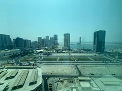 Spacious 1BR Apartment with Balcony &amp; Sea View | Free AC + Parking in Muwazzar