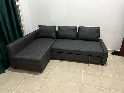 Stylish Storage Sofa Bed Minimalist grey design with strong wooden frame and easy conversion into a