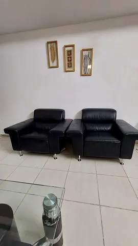2 Stylish Black Leather sofas