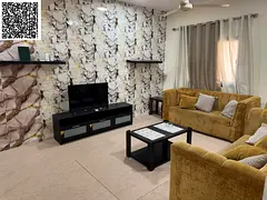A furnished 2 bedroom apartment with a living hall, kitchen, and 2 bathrooms is available for monthl