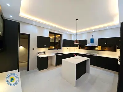 Freehold ownership for all nationalities. A stunning 6-bedroom villa in Al-Haliou 2 with a rooftop terrace. Includes electricity, water A C