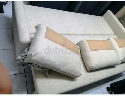Stylish Beige Sofa with Cushions