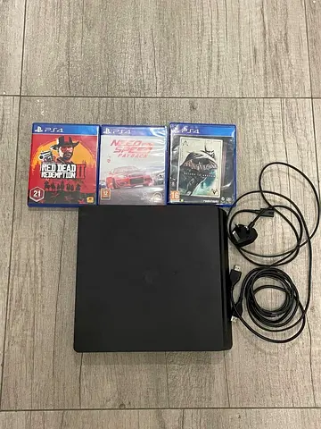Used ps4 slim with 3 games