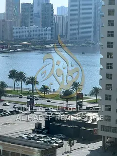 For annual rent in Sharjah – Al Majaz 1 – King Faisal Street A two-bedroom apartment with a livi