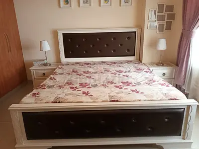 Elegant Queen Size Bed with Matching Nightstands and mattress