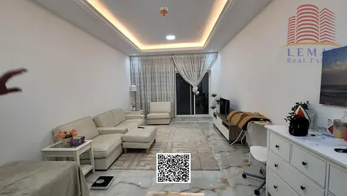 One-bedroom apartment with a living room on a high floor, partial sea view.