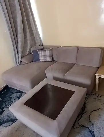 Comfortable L-Shaped Sofa with Ottoman