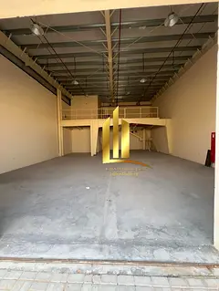 A warehouse for rent in the Sajaa Industrial Area, with an area of ​​3500 square feet, fully ser