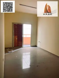 A comfortable two-bedroom apartment with a living room is available for annual rent in Al Nuaimiya 2