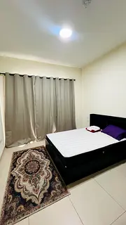 BED ROOM AVAILABLE WARSAN VILLAGE WITH PARKING