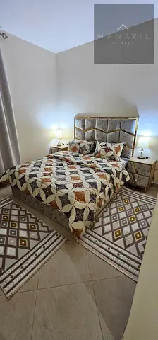 One-bedroom apartment in Al Taawun, Sharjah, furnished with luxury furniture.