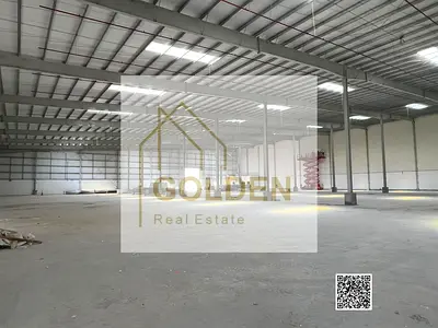 ارتفاع 14متر | مستودع صناعي جديد للإيجار بأم القيوين على شارع رئيسي