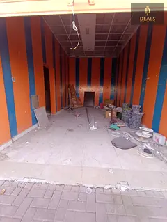 Prime Shop on Main Road in Al Mowaihat 2 – Ideal for Auto Services or Any Business with Practical 