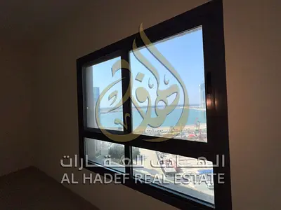 Spacious 2 Bedrooms + Hall for Rent in Al Mamzar – Sharjah! Free AC (Paid by Landlord) – Free Parking & Maintenance – Direct Dubai Exit