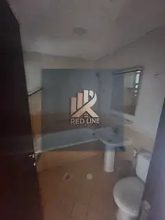 A distinctive apartment for rent in Al Majaz 3 with a spacious area and a beautiful view through a c