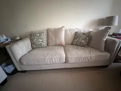Comfortable Beige Sofa with Cushions