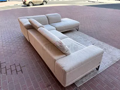 Almost like new Natuzzi Editon head adjustable L Shape sofa