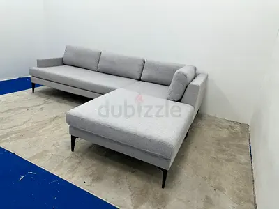Almost brand new west elm sofa with footstool
