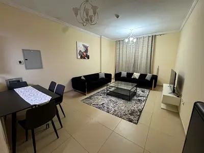 One-bedroom apartment with a living room for rent in Yasmeen Towers, Ajman, located in a prime area close to all essential service