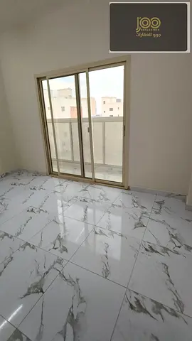 2BR apartment in Al Alia, balcony, 2 bathrooms, family-friendly, affordable rent AED 37,000.