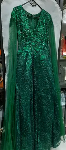 Party dress  Emerald color. Still new size M-L.