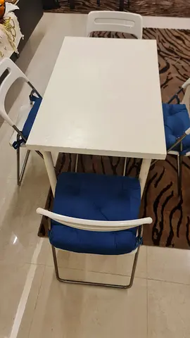 Modern White Dining Table with Blue Cushioned Chairs / Dimensions : 110cm length × 60cm width × 70cm