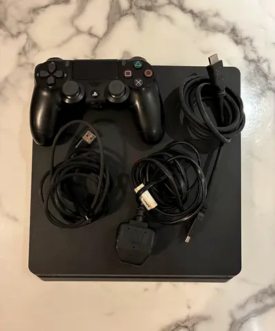 PlayStation 4 Console with Controller and Cables