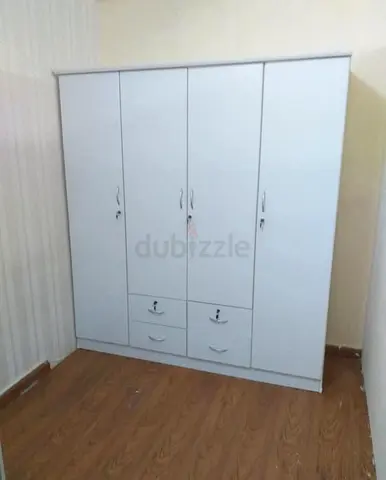 4 door wardrobe clothes selling new