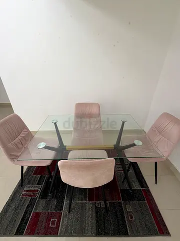 Glass dining table with 4 chairs for sale