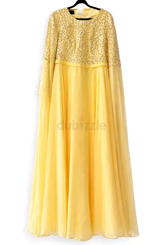 فستان فاخر أصفر ناعم  من تصميم كوين كراون لبس خمس ساعات فقط السعر المطلوب 1200درهم  قابل للتفاوض