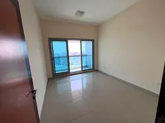 One bedroom and living room - annual rent - Ajman Corniche - central air conditioning - maintenance
