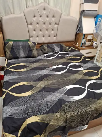 Elegant King-Size Bed with Stylish Headboard