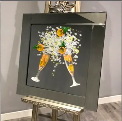 Framed Artwork of Citrus Splash in Champagne Flutes