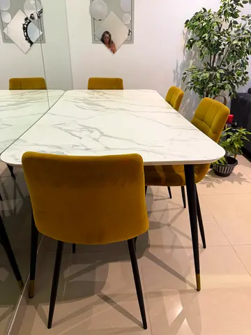 Elegant Marble Top Dining Table with Yellow velvet Chairs