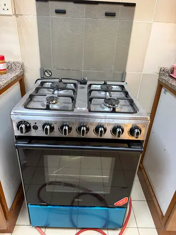 Modern Gas Cooker with Oven- free delivery inside Abu Dhabi