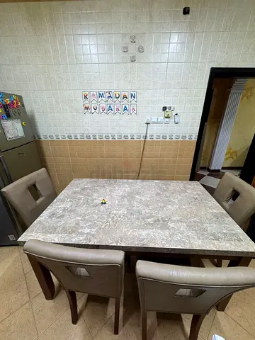 Home centre Stylish Dining Table with Four Chairs