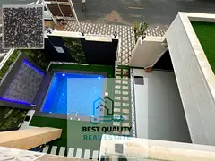 Modern VIP villa in Ajman with swimming pool and garden in a prestigious area