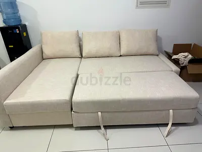 L-Shaped Sofa Bed in Neutral Fabric