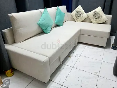 Comfortable L-Shaped Sofa with Cushions