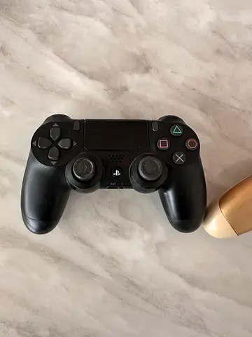 Ps4 controller jet black and gold