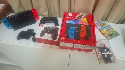 Nintendo Switch Console with Accessories and Games
