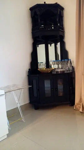 Black wooden cabinet corner