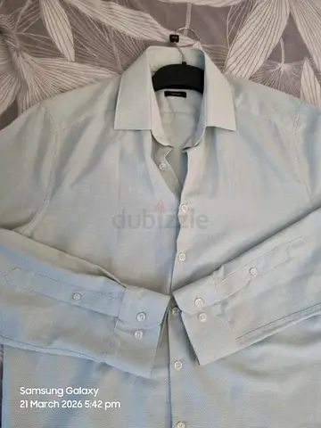 Brand new - Light Blue Button-Up Shirt. Lc waikiki - slim fit- Large
