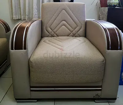 Stylish Beige Sofa Armchair with Brown Accents