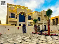 Luxury villa for sale in Al Helio – Ajman, 6 bedrooms and 2 living rooms, main street, 25-meter se